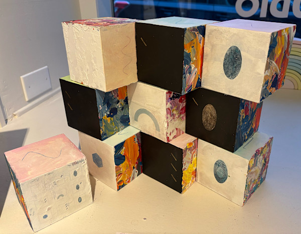 10-Block Prime Numbers Puzzle (3 x 3 grid  with key block - 4 inch cubes) by Juliet Fiss