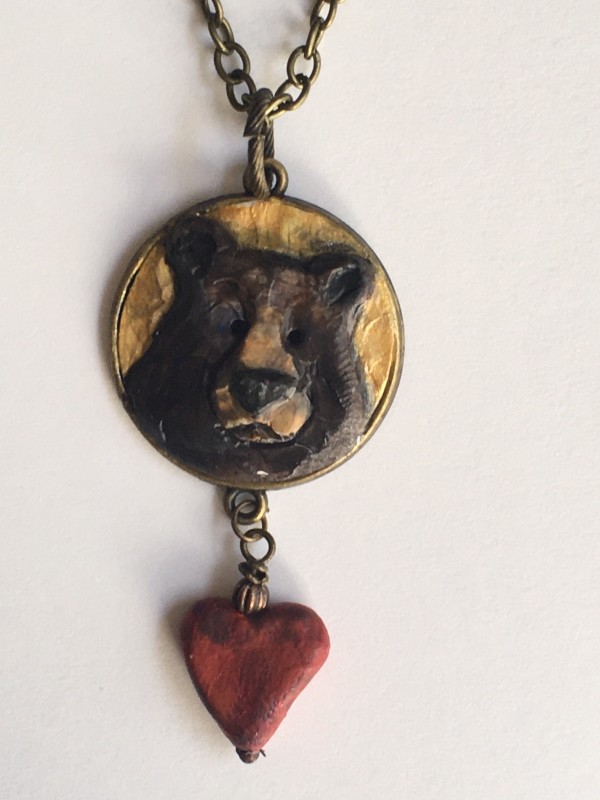 Black bear with heart necklace