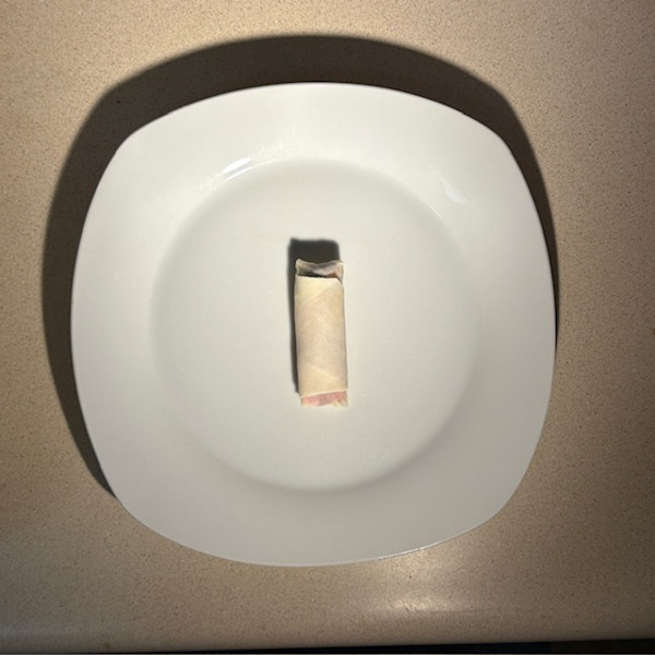 Eggrolling by Isabelle "Belle" Chau