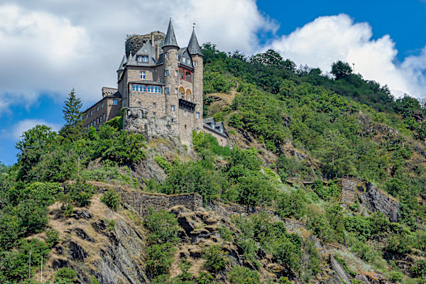 Katz Castle, a prominent medieval fortress located above the town of Sankt Goarshausen, Germany, along the Rhine River. by David Whited