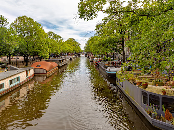 Historic canals in Amsterdam, Netherlands. by David Whited