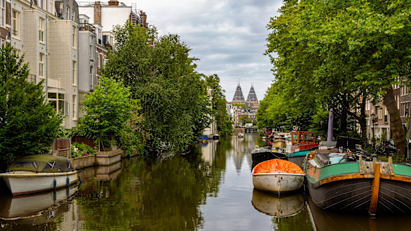Historic canals in Amsterdam, Netherlands. by David Whited