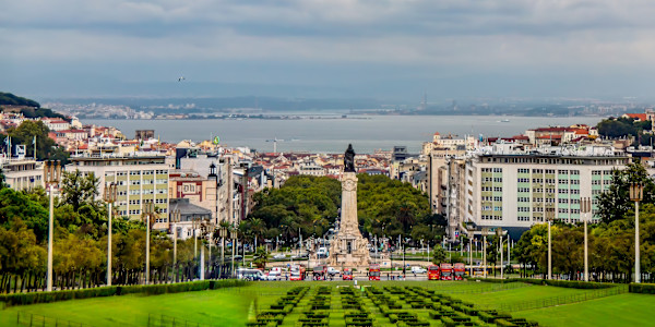 Eduardo VII Park in Lisbon, Portugal, looking down towards the city center and the Tagus River estuary. by David Whited