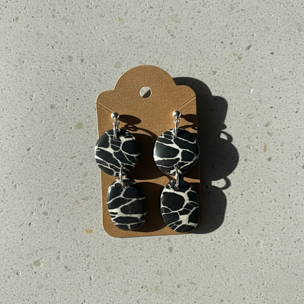 Black Marble Circle Drop Posts by Breanna Cole, Image 1.