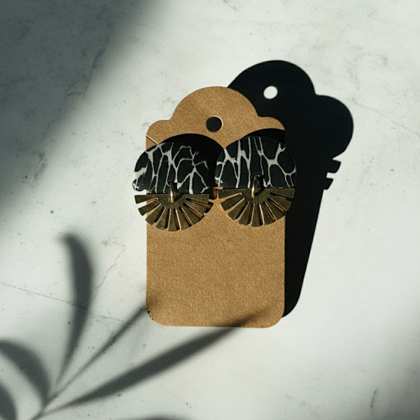 Black Marble Semicircle Post with Gold Burst by Breanna Cole, Image 1.