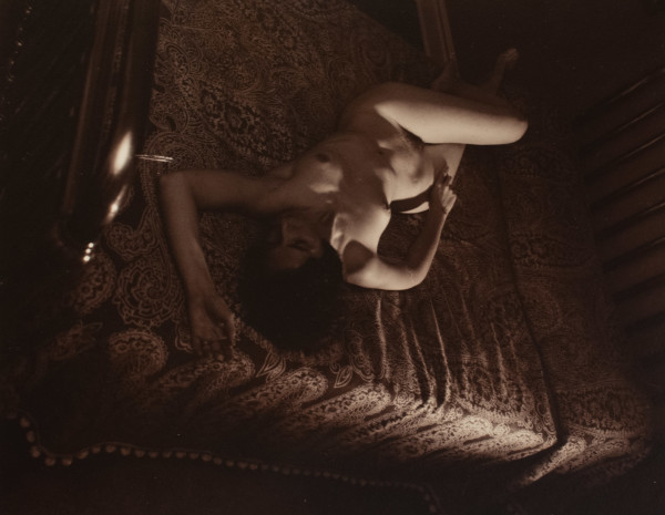 Margarite on Brass Bed by Hal Gould