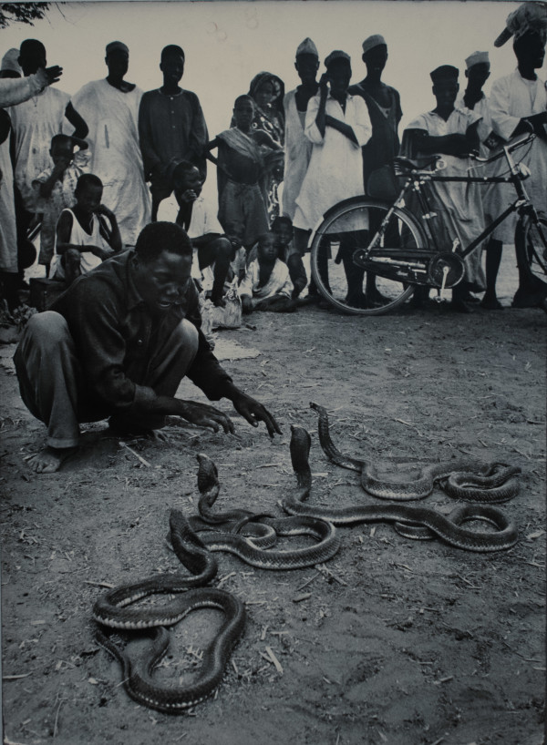 Snake Charmer in Nigeria by Ken Heyman