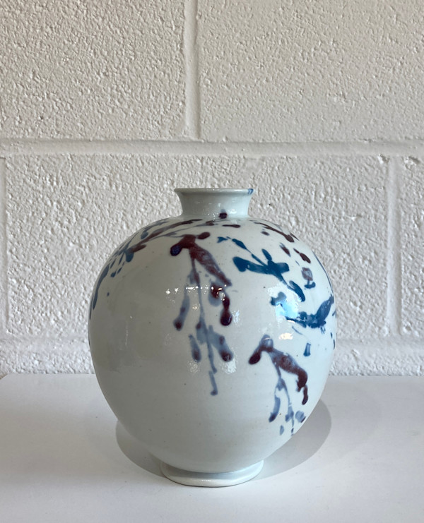 Porcelain -  medium vessel with multicolor leaves