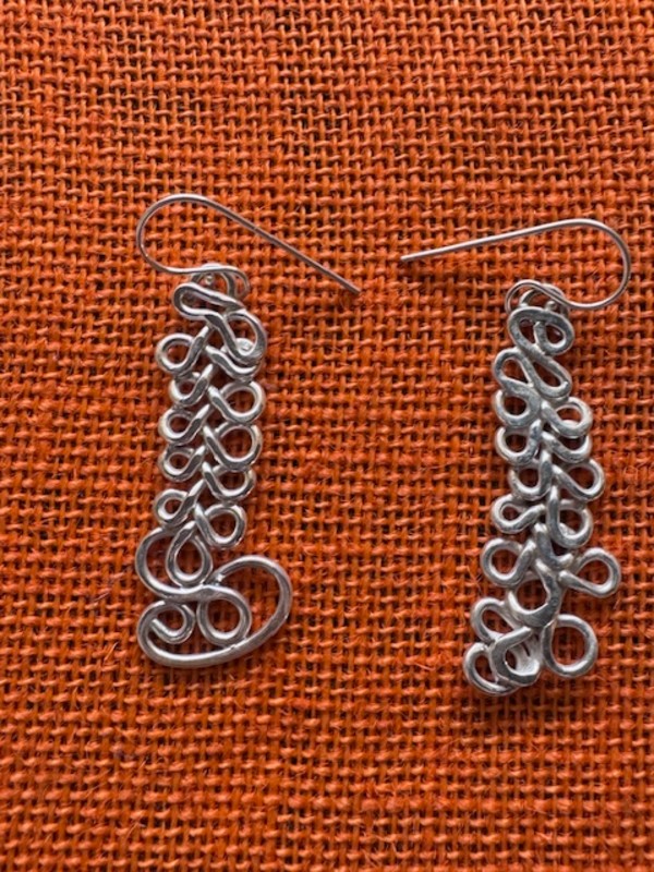 Hammered Twisted Earrings by Ichia Tiyi