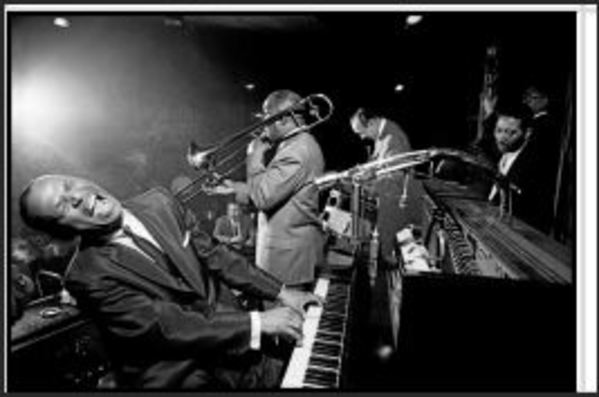 Earl Hines on Piano; Jimmy Archey on Trombone; Francis Joseph 'Muggsy' Spanier on Cornet; and Earl Watkins on Drums. San Francisco, California, USA, 1958 by Dennis Stock