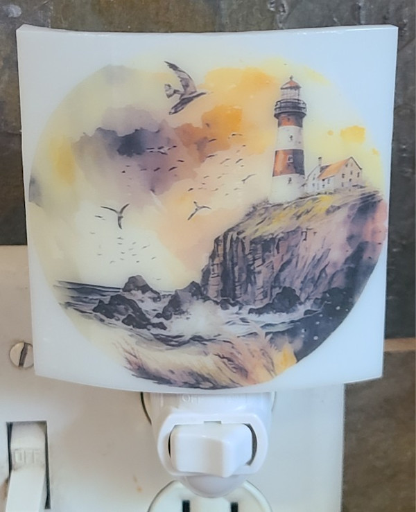 Nightlight-Lighthouse on Sea Rocks by Kathy Kollenburn
