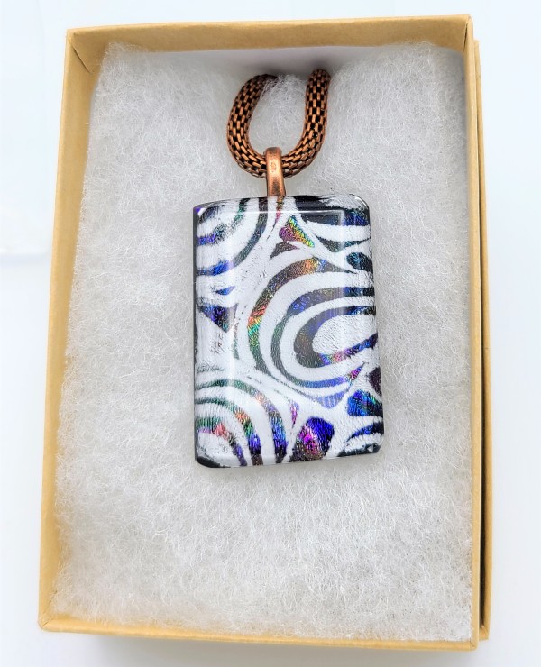 Necklace with White Swirl Pattern on Dichroic