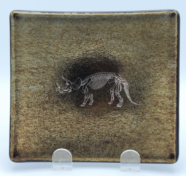 Small Plate with Triceratops on Black Irid by Kathy Kollenburn