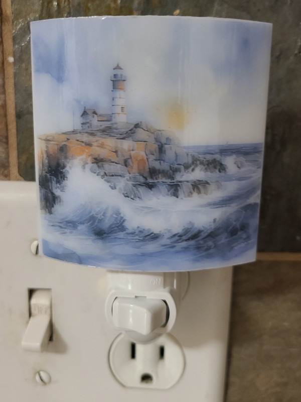 Nightlight-Lighthouse on Rocks by Kathy Kollenburn