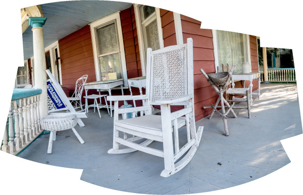 Chairs on a Porch by Alan Powell