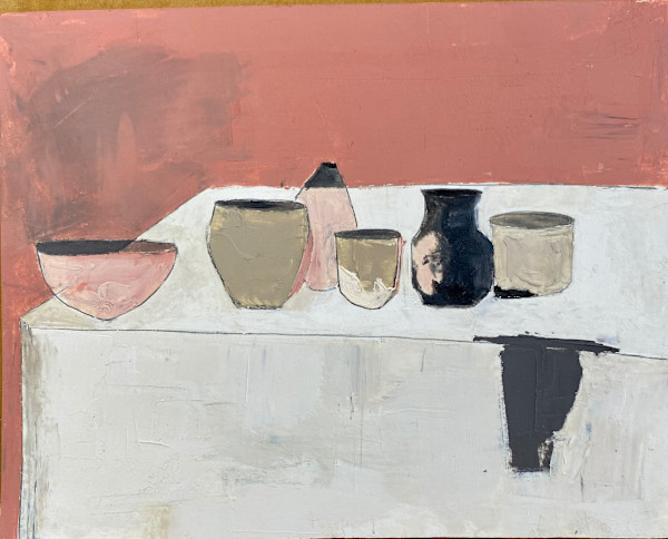white table pink wall by Kate Burnim
