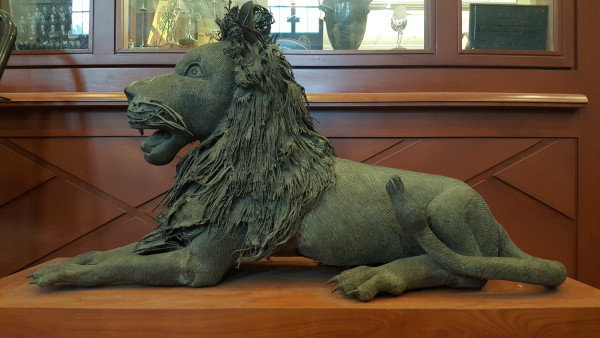 Two bronze lions by Cameroon