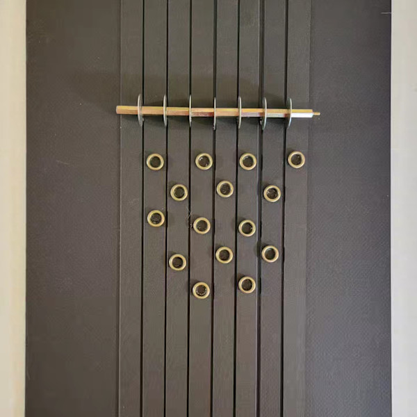 Washers and barrel nuts with eyelets by Jude Barton