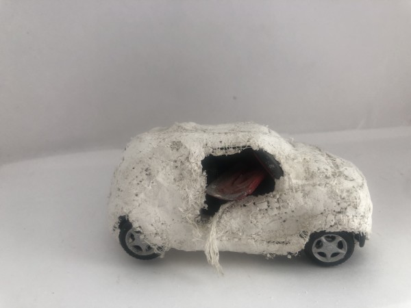 Bandaged toy car by CLARE SMITH