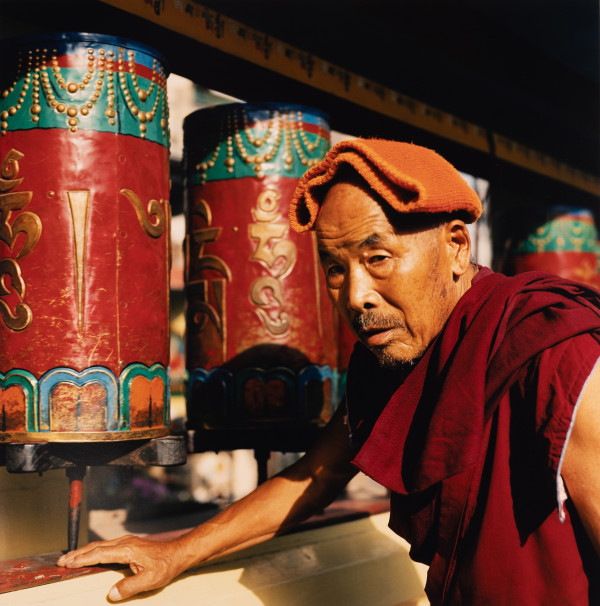 Monk with Prayer Wheels (Dharamsala, India) by Amie Potsic