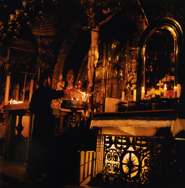Candle lighting, Church of the Holy Sepulchre (Jerusalem, Israel) by Amie Potsic
