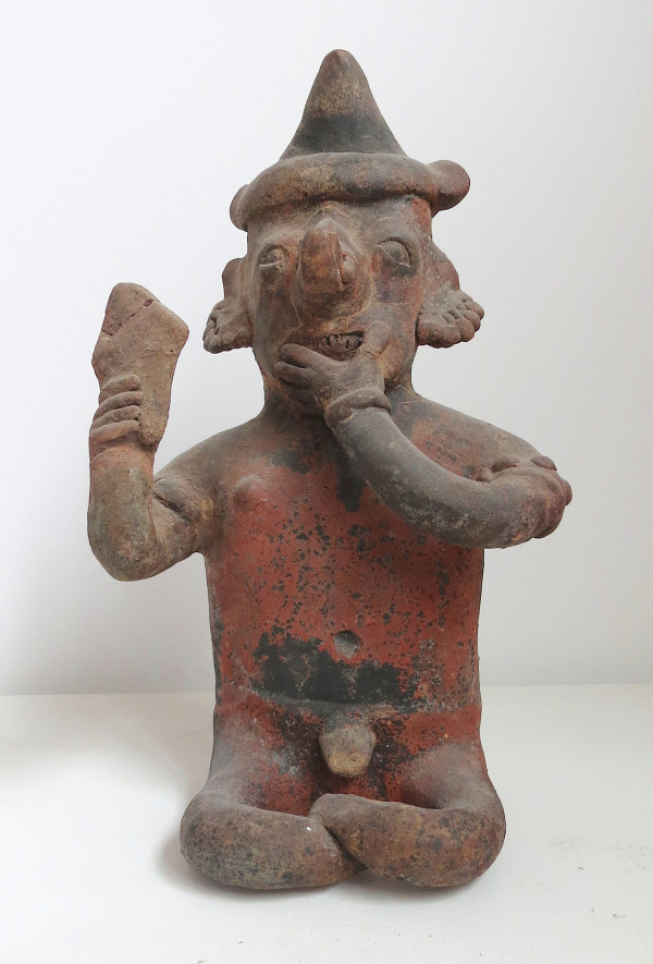 Seated Male Figure Laughing by Pre-Columbian