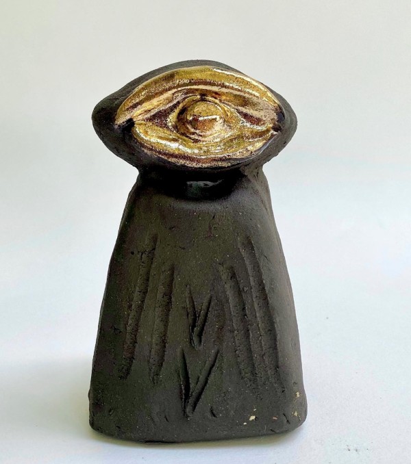 Eye Idol (single eye, gold lustre on black clay) by Chantal Powell 