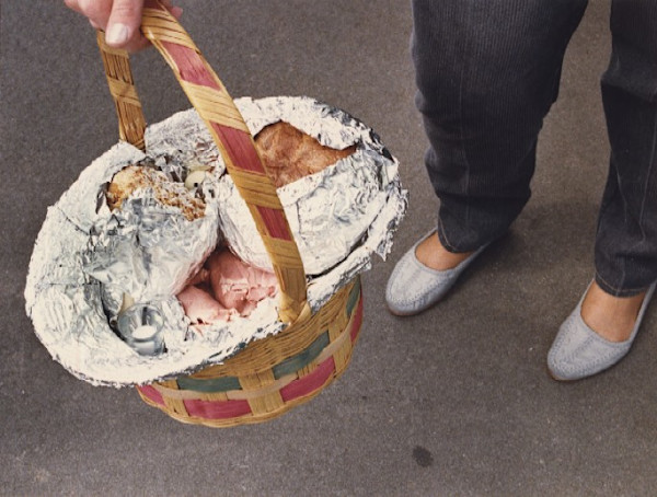 Swienconka:woman holding basket with tin foil by Marion Faller