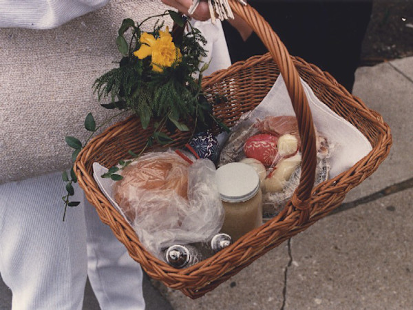 Swienconka:woman w/basket w/yellow flower by Marion Faller