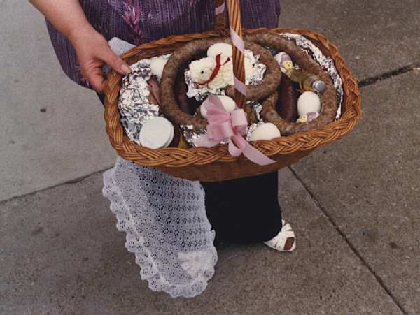 Swienconka:woman holding basket with pink box by Marion Faller