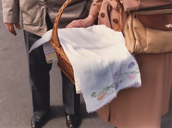 Swienconka:couple w/basket w/tulip,embroidered clo by Marion Faller
