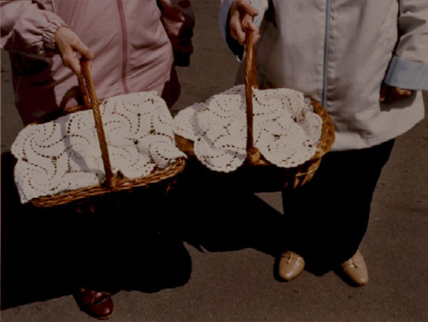 Swienconka:2 women-pink&white coats w/baskets by Marion Faller
