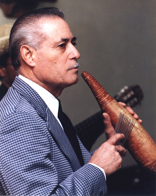 Man Playing Guiro by Charles Agel