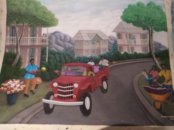 DRIVING RED TRUCK  (UNFRAMED) by AMERLIN DELINOIS, Image 1.