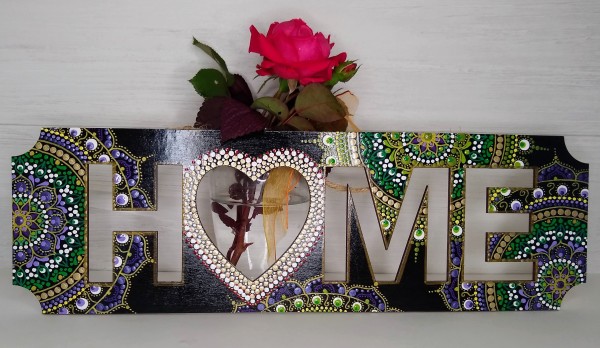 Home cutout sign by Madelin Miller