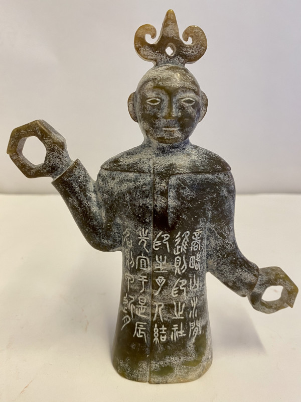Stone Figure With Ringed Hands