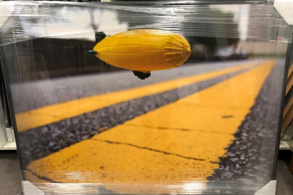 Inches Above Earth Series "Approximate Altitude ? Inches " (Yellow Blimp over Yellow Lines) by Michael Reese