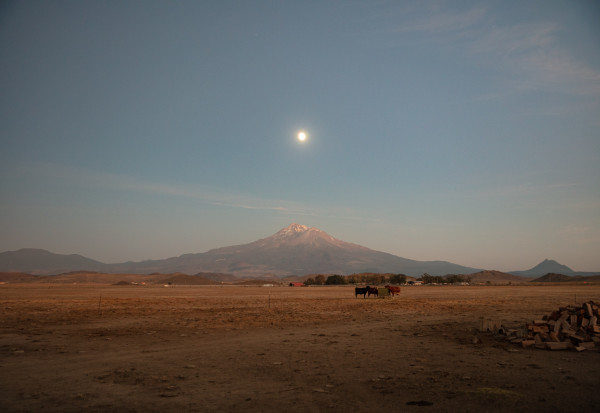 Moonrise Over Mount Shasta by T. Chick McClure
