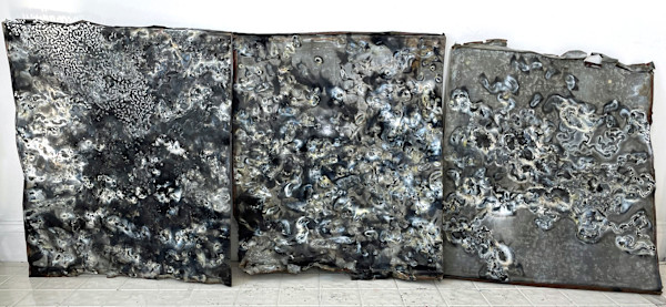 Blowtorch drawing on antique zinc roofing. Triptych by Marieken Cochius