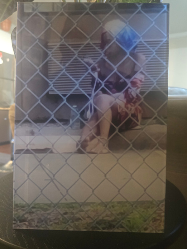 Untitled- Candid from Afar by Niko Cherry