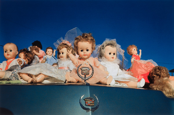 Untitled (Baby Doll on Cadillac) by William Eggleston