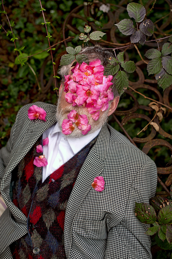 A Shatter of Camellia Blooms Arranged Themselves over Tom's Face by Raymond Grubb