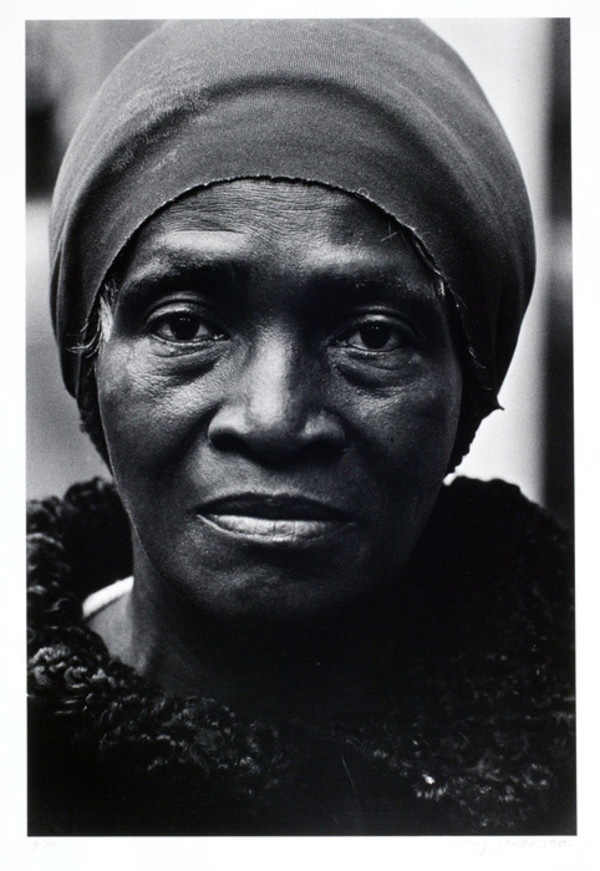 Black Woman, Rockefeller Center, N.Y.C. by Louis Stettner