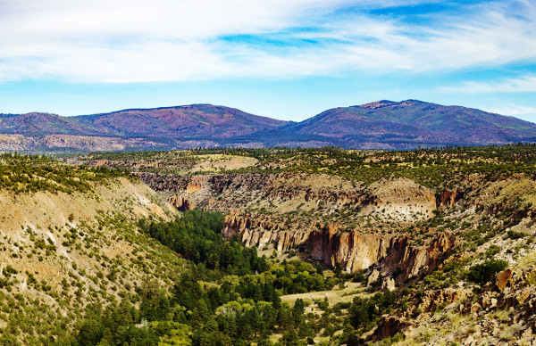Frijoles Canyon and Jemez Mountains Morning by Rodney Buxton