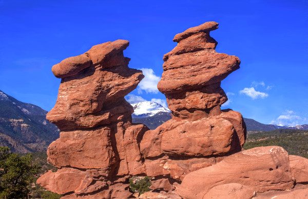 Siamese Twins and Pikes Peak, Morning by Rodney Buxton