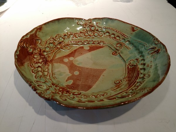 Plates in green and brown glaze (3) by Dorothy Pulsifer