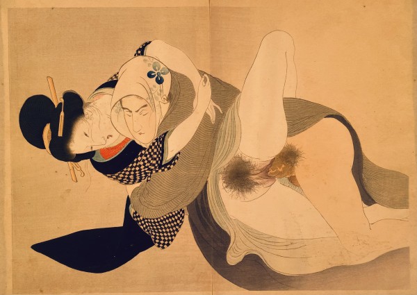 Woman with man wearing a shawl