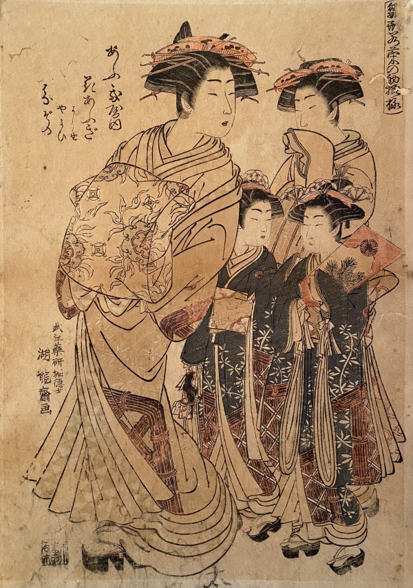 Four women (two in white, two in black)