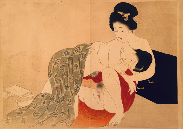 A couple under a green blanket