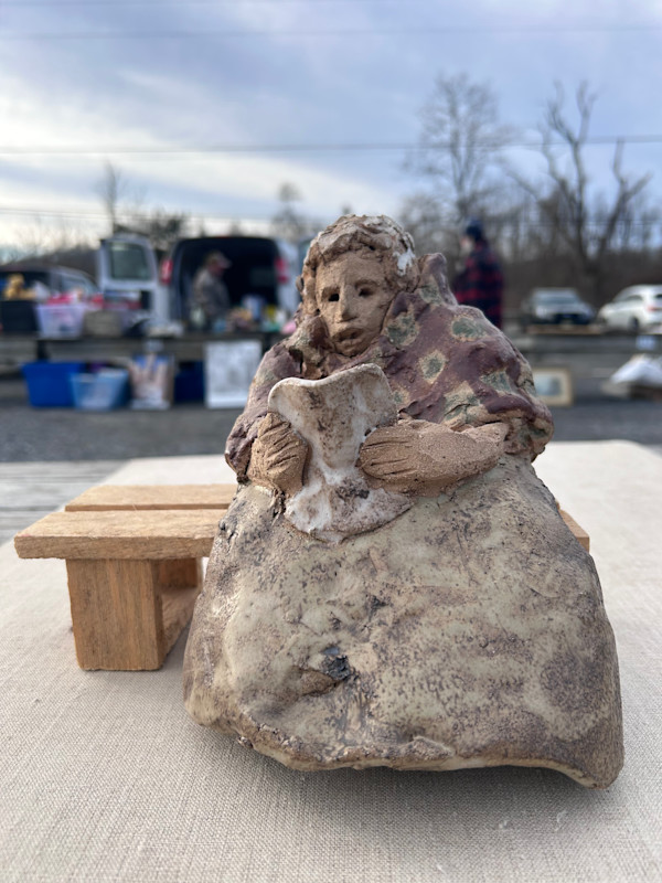 Clay Figurine, woman on bench